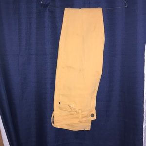 Extra long yellow skinny jeans